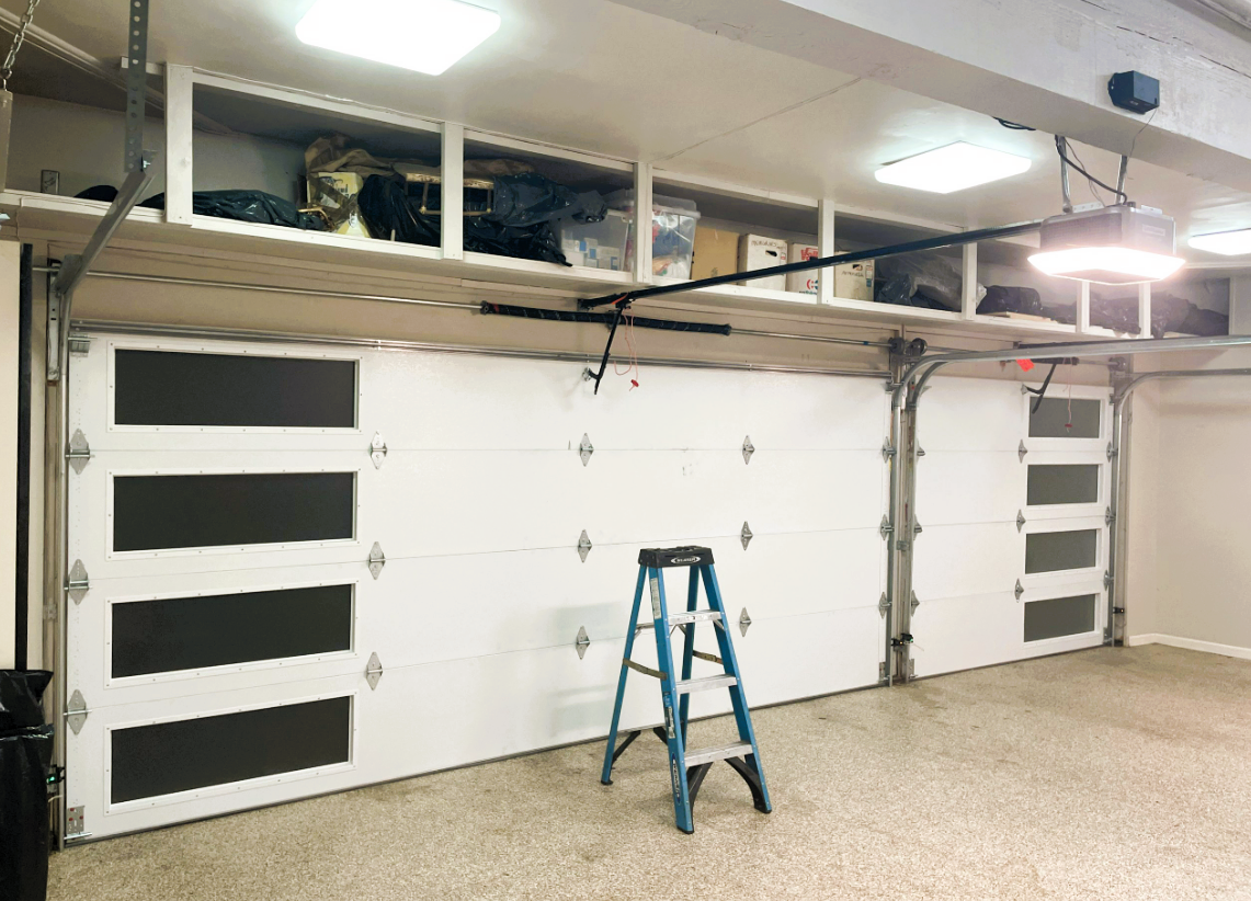 Alt Text: "Technician Performing Garage Door Opener Repair in Myaka City